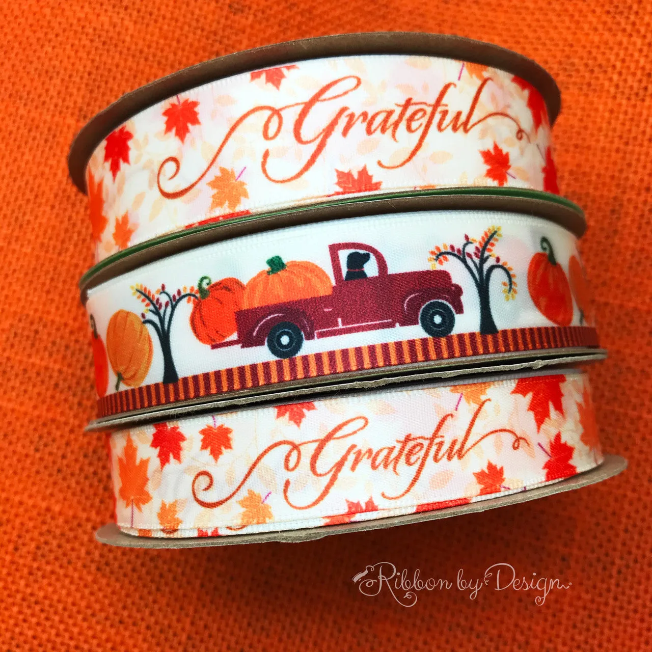 Thanksgiving Grateful ribbon with tossed Fall leaves in orange and yellow printed on 7/8" antique white satin